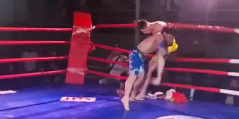 MMA Fight Turns Chaotic as Spear Launches Fighters Out of the Ring